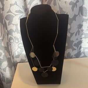 Zenze vintage Gold and Black Disc Necklace.
Good condition. Shows some wear.